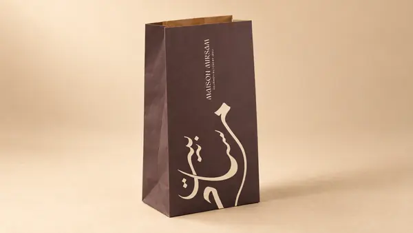 Packaging: dark paper bag